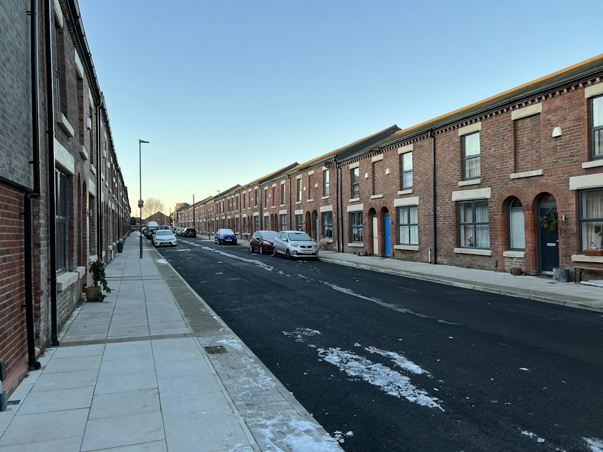 A street of brick terraced houses